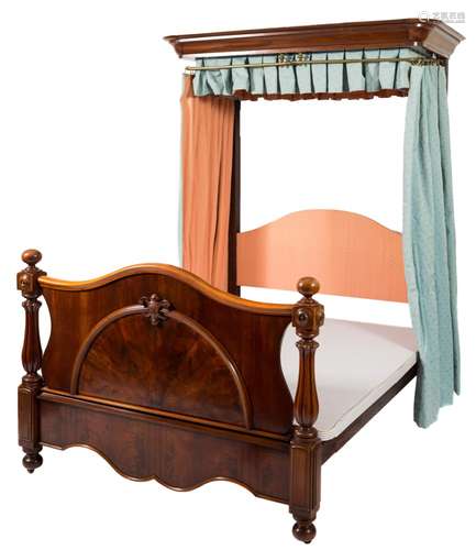 A Victorian mahogany half tester bed:, the canopy with a moulded cornice,