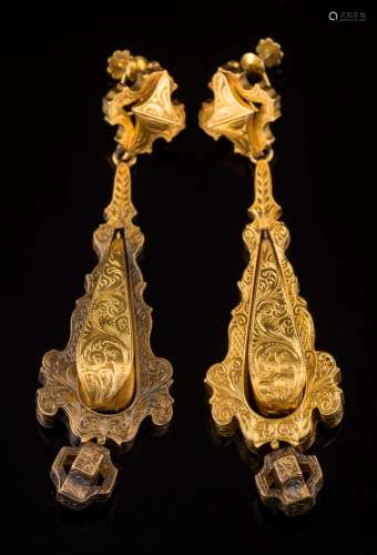 A pair of 19th century gold pendant drop earrings: each articulated pear-shaped drop with foliate