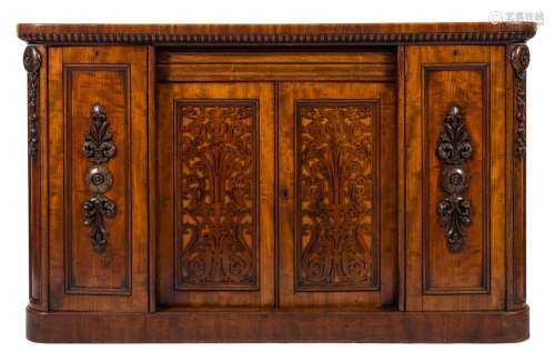 A Victorian mahogany low side cabinet:, the top with rounded corners and a reeded dentil edge,