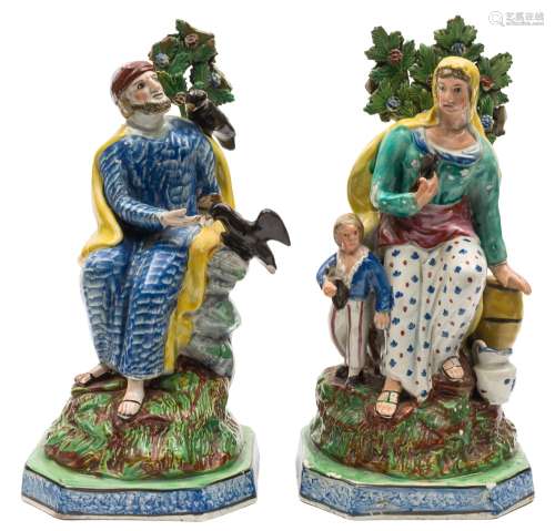A pair of large Staffordshire pearlware figures of Elijah and the Ravens and the Widow and Child: