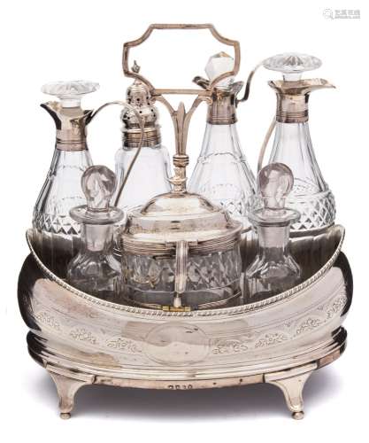 A George III silver cruet stand, all marks worn: crested,