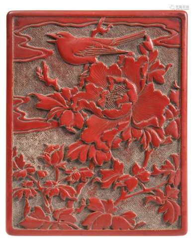 A Chinese cinnabar lacquer rectangular box and cover: the lid decorated with a bird perched amongst