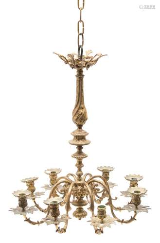 A gilt brass eight-branch chandelier: with foliate decorated urn-shaped nozzles,