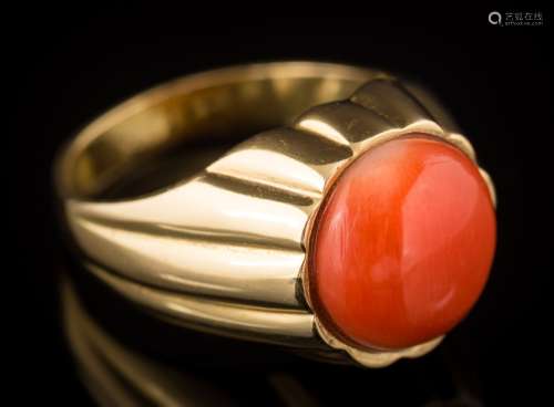 A coral mounted, single-stone ring: the circular coral approximately 10.6mm diameter, 7.