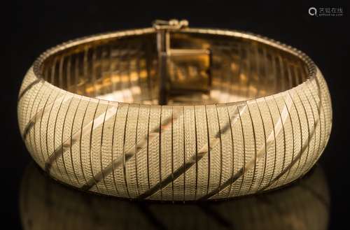 A 9ct gold articulated bracelet: 18cm long, approximately 25gms gross weight.