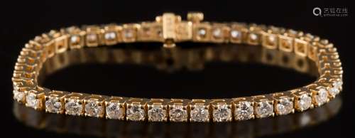 A diamond line bracelet: set with round, brilliant-cut diamonds estimated to weigh a total of 4.