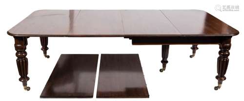 A good early 19th Century mahogany extending dining table:, with a telescopic action,