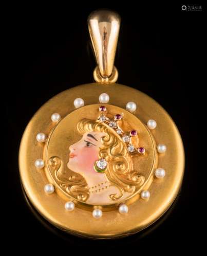 An early 20th century enamelled gold, ruby,