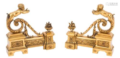 A pair of French gilt brass chenets:,
