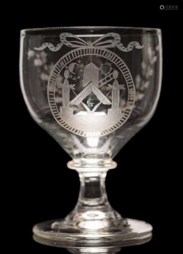 A Masonic glass rummer: the bowl wheel cut with an oval ribbon bound panel containing Masonic