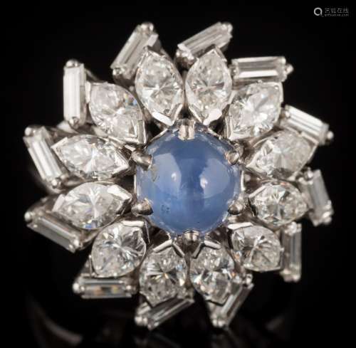 A star sapphire and diamond circular cluster ring: with central round star sapphire approximately 6.