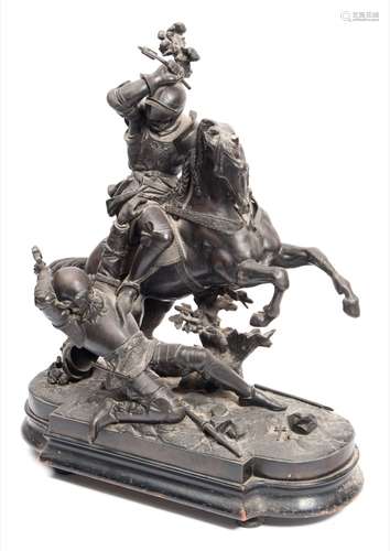 A large bronzed spelter figure group of knights in combat: depicting a mounted knight charging down