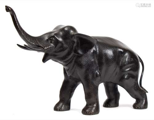 A large Japanese bronze model of an elephant: with raised trunk and open mouth, unsigned, 54cm.