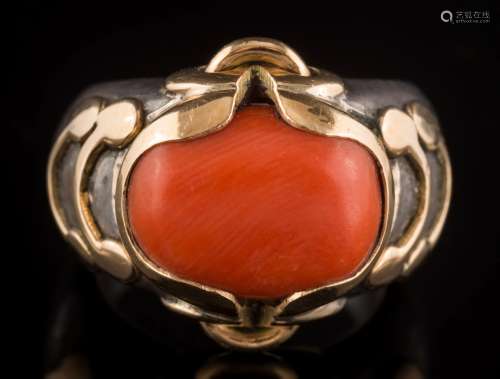 A silver and coral mounted ring: the un-hall marked,