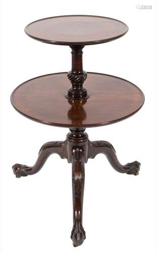 A mid 18th Century carved mahogany circular two tier graduated dumb waiter:,