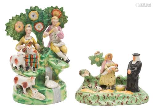 Two late Staffordshire pottery bocage groups: comprising a musical group 'Rustic soiree' and a
