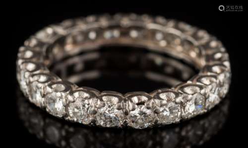 A diamond eternity ring: with twenty-two circular,