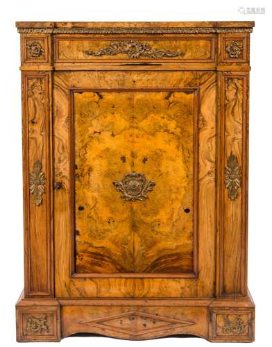 A Victorian walnut and gilt metal mounted pier cabinet:,