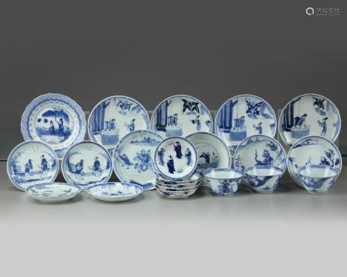 A GROUP OF CHINESE BLUE AND WHITE 'FIGURAL' CUPS AND SAUCERS