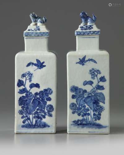 A PAIR OF CHINESE BLUE AND WHITE SQUARE-SECTION TEA CADDIES AND COVERS
