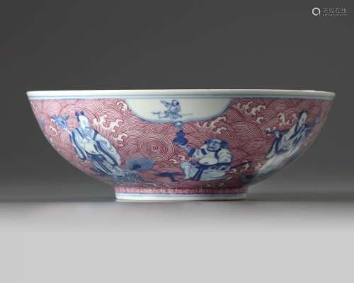 A CHINESE PUCE-ENAMELLED BLUE AND WHITE 'IMMORTALS' BOWL