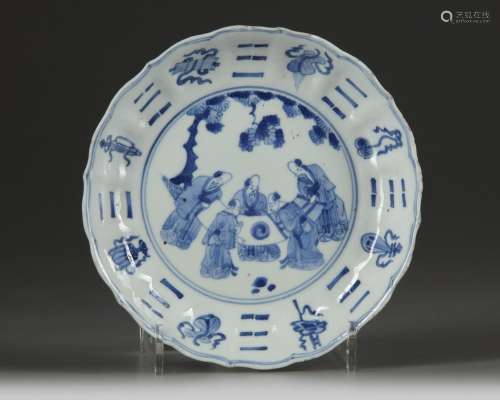 A CHINESE BLUE AND WHITE 'EIGHT DAOIST EMBLEMS' BARBED RIM DISH