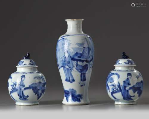 A PAIR OF CHINESE BLUE AND WHITE 'LADIES' JARS AND COVERS AND A 'FIGURAL' VASE