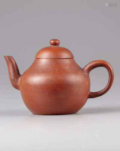 A CHINESE YIXING TEAPOT AND COVER