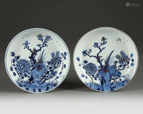A PAIR OF CHINESE GILT-DECORATED BLUE AND WHITE PHEASANT AND PEONY DISHES