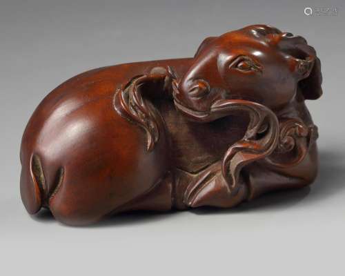 A CHINESE CARVED BOXWOOD RAM