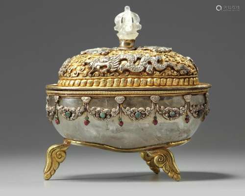 A TIBETAN ROCK CRYSTAL SILVER AND GILT COPPER ALTAR VESSEL AND COVER