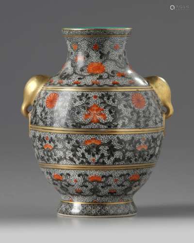 A SMALL CHINESE IRON RED AND GILT-DECORATED VASE, HU