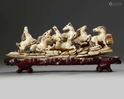 A CHINESE CARVED IVORY 'EIGHT HORSES OF MU WANG' GROUP