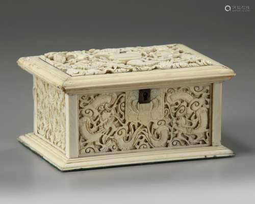 A CANTONESE CARVED IVORY 'DRAGON' BOX