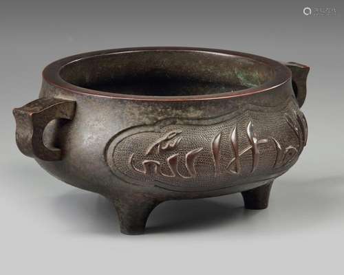 A CHINESE BRONZE 'ISLAMIC MARKET' TRIPOD CENSER