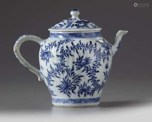 A CHINESE BLUE AND WHITE MOULDED TEAPOT