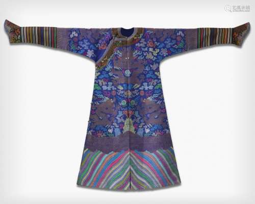 A CHINESE BLUE-GROUND BROCADE 'DRAGON' ROBE, JIFU