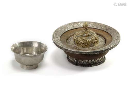 A MONGOLIAN SECOND-GRADE SILVER TEA BOWL AND PARCEL-GILT SILVER COVER, AND A WHITE METAL-MOUNTED WOODEN STEM DISH
