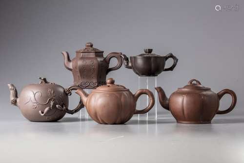 A GROUP OF FIVE CHINESE YIXING TEAPOTS