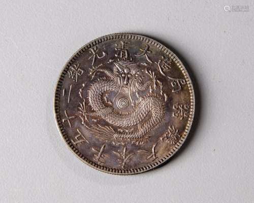 A CHINESE SILVER COIN