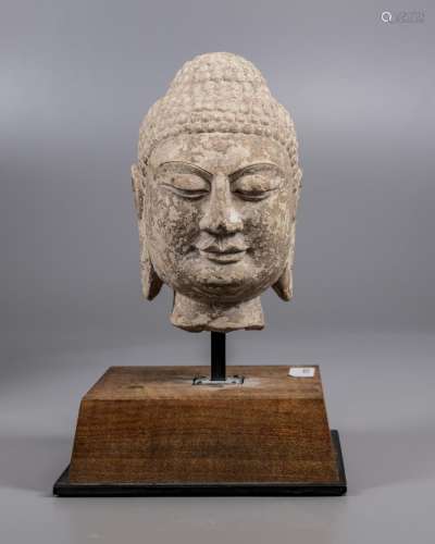 A CHINESE STONE BUDDHA HEAD