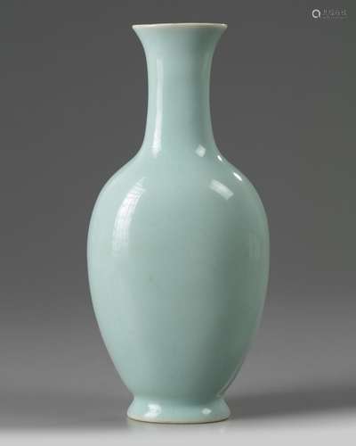 A CHINESE PALE CELADON-GLAZED SLENDER VASE