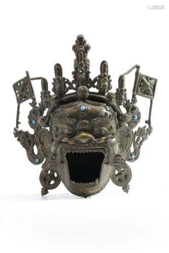 A MONGOLIAN BRONZE MAHAKALA-HEAD RITUAL WATER POT