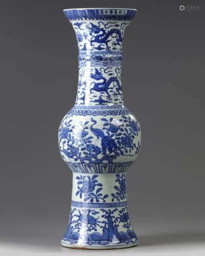 A LARGE CHINESE BLUE AND WHITE DRAGON VASE