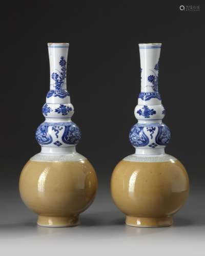 A PAIR OF CHINESE CAFÉ-AU-LAIT-GLAZED BLUE AND WHITE TRIPLE GOURD VASES