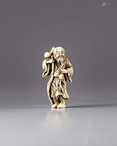 A JAPANESE IVORY NETSUKE