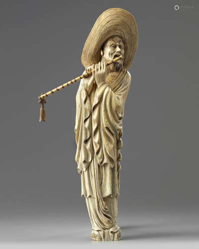 A CARVED CHINESE MUSICIAN