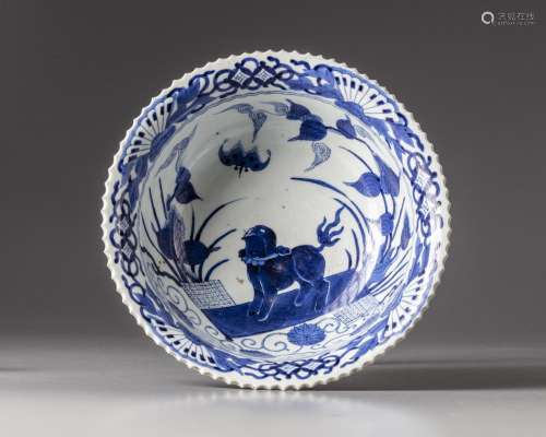 A JAPANESE BLUE AND WHITE BOWL DEPICTING A FU DOG