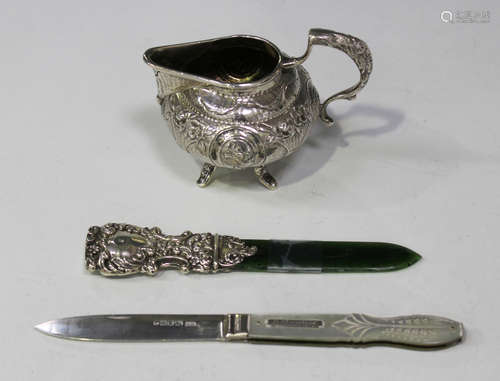 An early Victorian silver and mother-of-pearl folding fruit knife, the handle engraved with