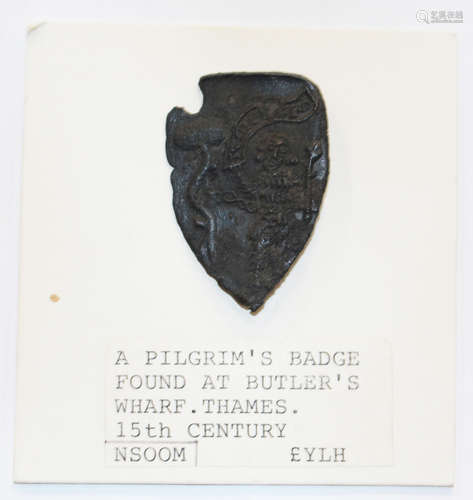 A 15th century pewter pilgrim's badge of shield form, purportedly found at Butler's Wharf, River